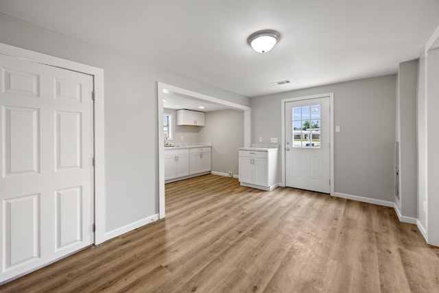 102 Hodges St N, Cowan, TN 37318 - interior space featuring light wood-type flooring and baseboards
