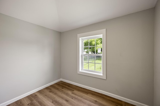 102 Hodges St N, Cowan, TN 37318 - empty room featuring baseboards and wood finished floors
