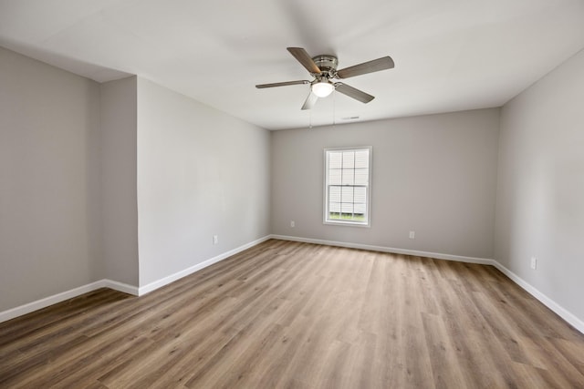 102 Hodges St N, Cowan, TN 37318 - spare room featuring wood finished floors and a ceiling fan