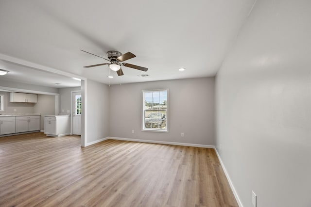 102 Hodges St N, Cowan, TN 37318 - unfurnished living room with healthy amount of natural light, ceiling fan, light wood-style flooring, and recessed lighting