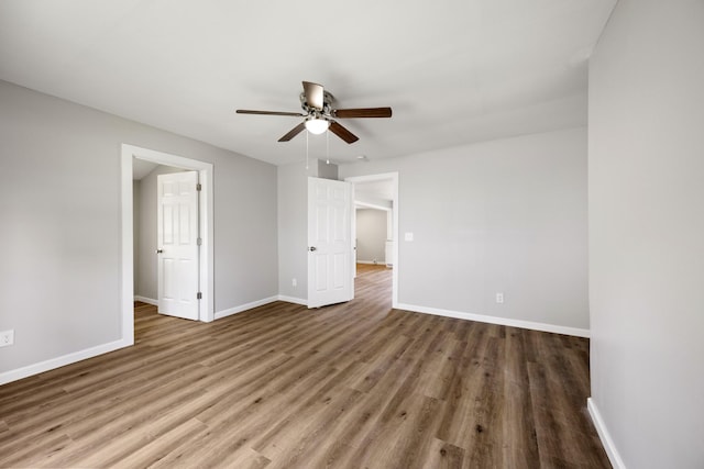102 Hodges St N, Cowan, TN 37318 - unfurnished room with a ceiling fan and wood finished floors