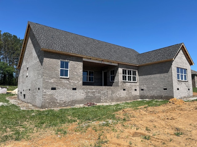 8246 Aedc Rd, Estill Springs, TN 37330 - rear view of house featuring crawl space, brick siding, and roof with shingles