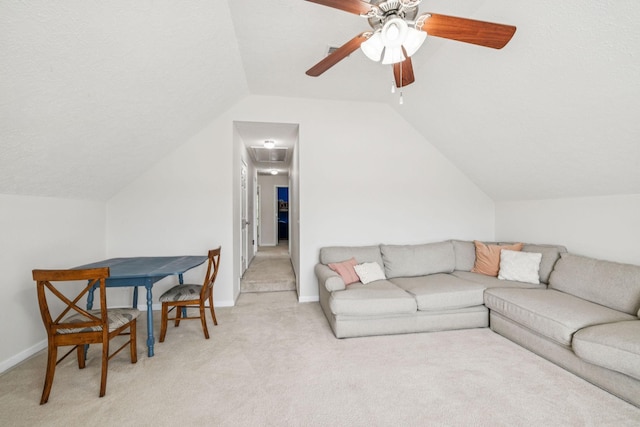 1443 Bern Dr, Spring Hill, TN 37174 - living room with vaulted ceiling, light colored carpet, a ceiling fan, and attic access