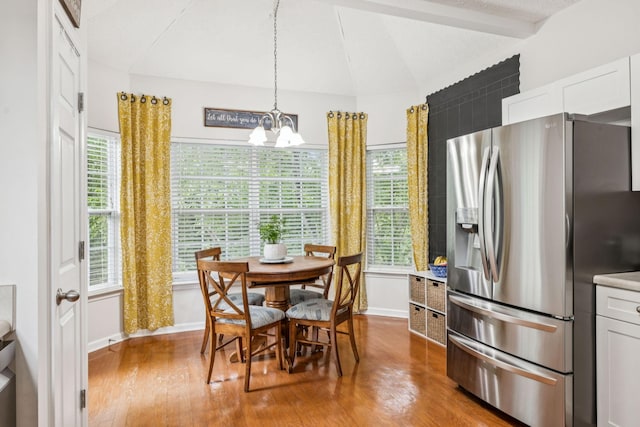 1443 Bern Dr, Spring Hill, TN 37174 - dining room with wood finished floors, a chandelier, plenty of natural light, and beam ceiling