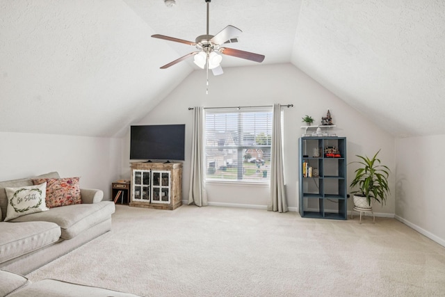 1443 Bern Dr, Spring Hill, TN 37174 - carpeted living room with a ceiling fan, lofted ceiling, and a textured ceiling
