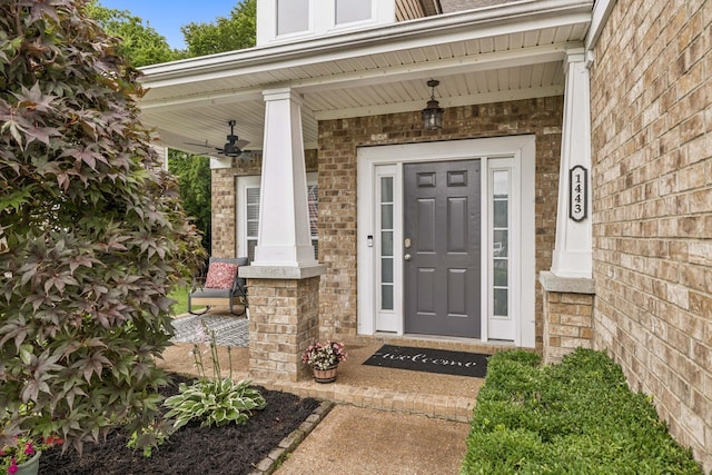 1443 Bern Dr, Spring Hill, TN 37174 - property entrance featuring brick siding, covered porch, and a ceiling fan