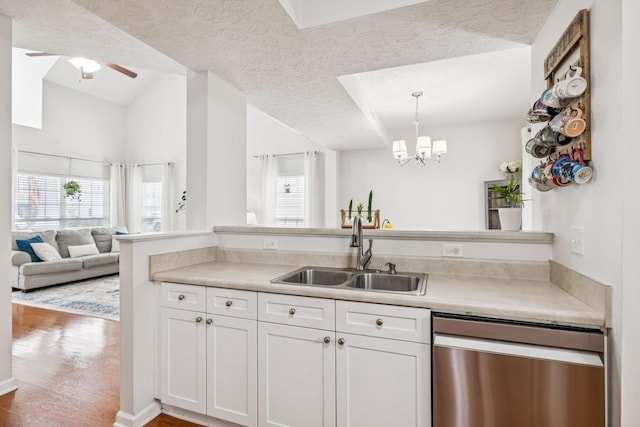 1443 Bern Dr, Spring Hill, TN 37174 - kitchen featuring stainless steel dishwasher, white cabinets, plenty of natural light, and a ceiling fan