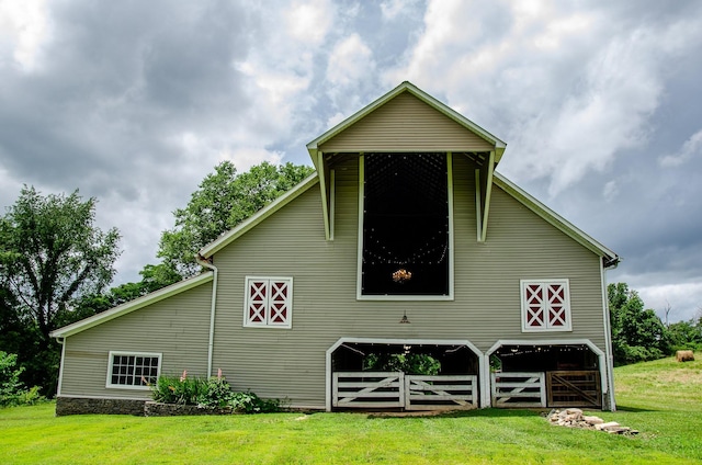 4929 Snow Creek Rd, Santa Fe, TN 38482 - view of property exterior featuring a yard, a barn, and an outbuilding