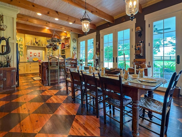4929 Snow Creek Rd, Santa Fe, TN 38482 - dining space with healthy amount of natural light, a chandelier, and beamed ceiling