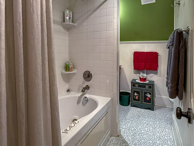 4929 Snow Creek Rd, Santa Fe, TN 38482 - bathroom with a wainscoted wall, shower / bath combo with shower curtain, and tile patterned flooring
