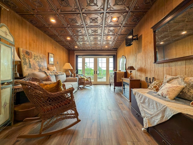 4929 Snow Creek Rd, Santa Fe, TN 38482 - sitting room featuring an ornate ceiling, wooden walls, hardwood / wood-style floors, and french doors