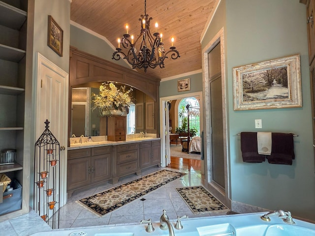 4929 Snow Creek Rd, Santa Fe, TN 38482 - full bath with wood ceiling, built in shelves, double vanity, a bathtub, and a chandelier