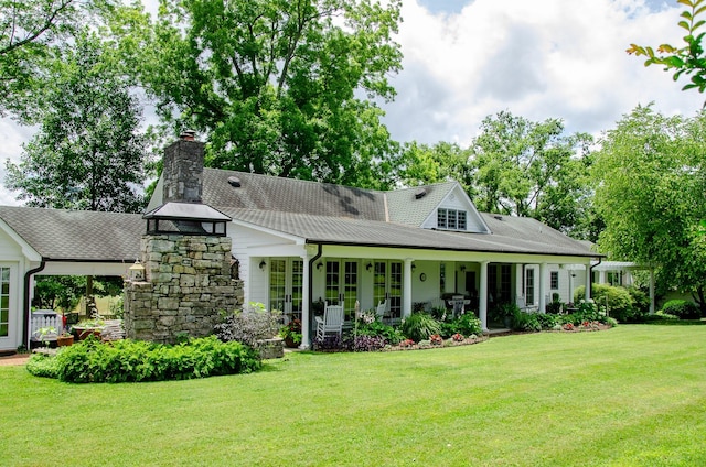 4929 Snow Creek Rd, Santa Fe, TN 38482 - view of front of home featuring a front lawn, a chimney, and a shingled roof