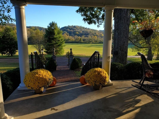 4929 Snow Creek Rd, Santa Fe, TN 38482 - covered porch with a lawn