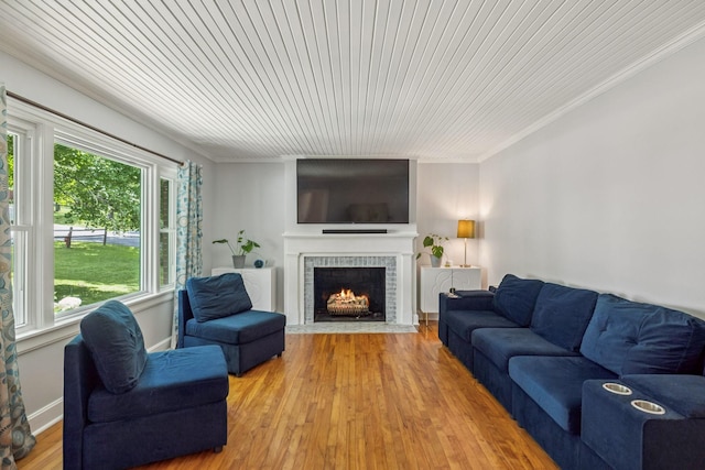 1338 Ardee Ave, Nashville, TN 37216 - living area with ornamental molding, a fireplace, wood finished floors, and wood ceiling
