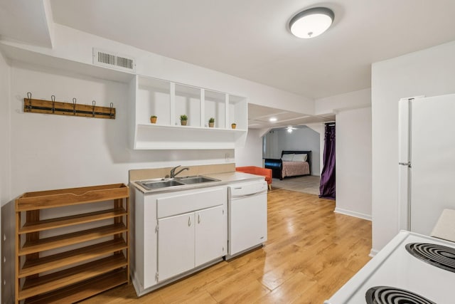 1338 Ardee Ave, Nashville, TN 37216 - kitchen with white appliances, open shelves, white cabinets, light wood-style flooring, and light countertops