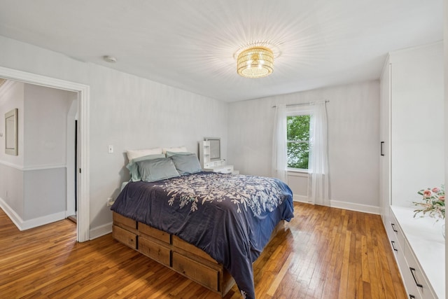 1338 Ardee Ave, Nashville, TN 37216 - bedroom featuring light wood-style flooring and a chandelier