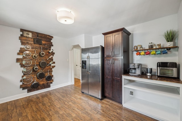 1338 Ardee Ave, Nashville, TN 37216 - kitchen with stainless steel fridge with ice dispenser, wood finished floors, dark brown cabinets, and open shelves
