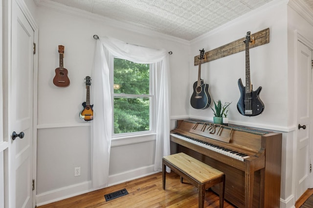 1338 Ardee Ave, Nashville, TN 37216 - sitting room featuring plenty of natural light, wood finished floors, ornamental molding, and an ornate ceiling