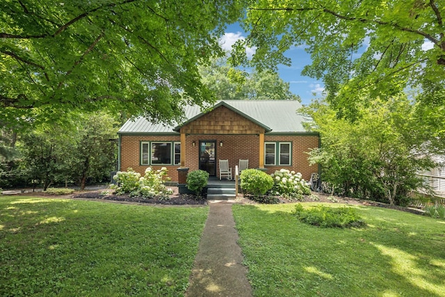 1338 Ardee Ave, Nashville, TN 37216 - single story home with a front yard, brick siding, and a metal roof