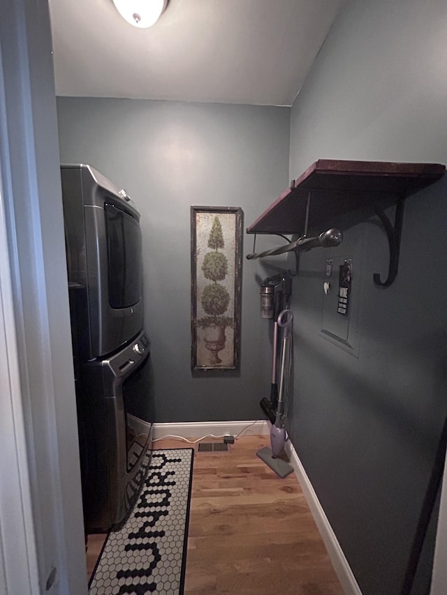 207 Walnut St, Springfield, TN 37172 - washroom with estacked washer and dryer and light wood-style floors