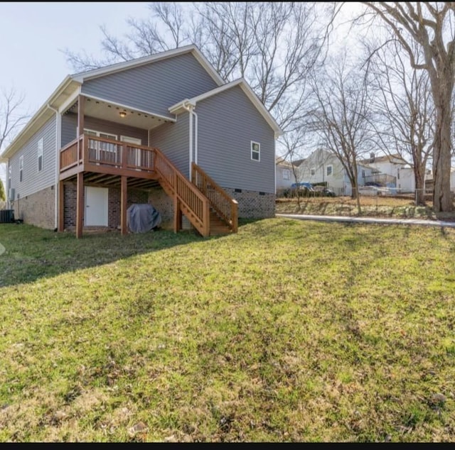 207 Walnut St, Springfield, TN 37172 - back of property featuring stairs, a deck, and a yard