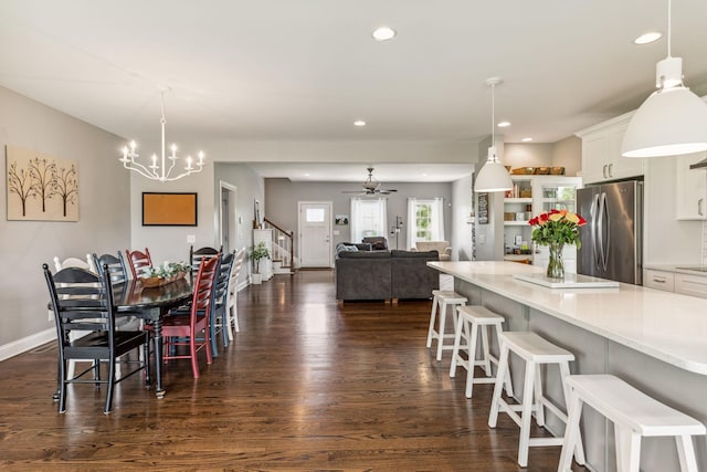 5077 Joe Peay Rd, Spring Hill, TN 37174 - dining area with dark wood-style floors, recessed lighting, a chandelier, stairs, and a ceiling fan