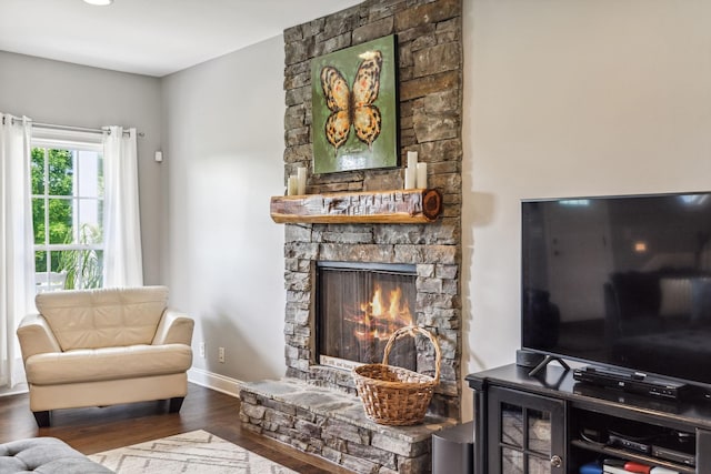 5077 Joe Peay Rd, Spring Hill, TN 37174 - living area with wood finished floors and a stone fireplace