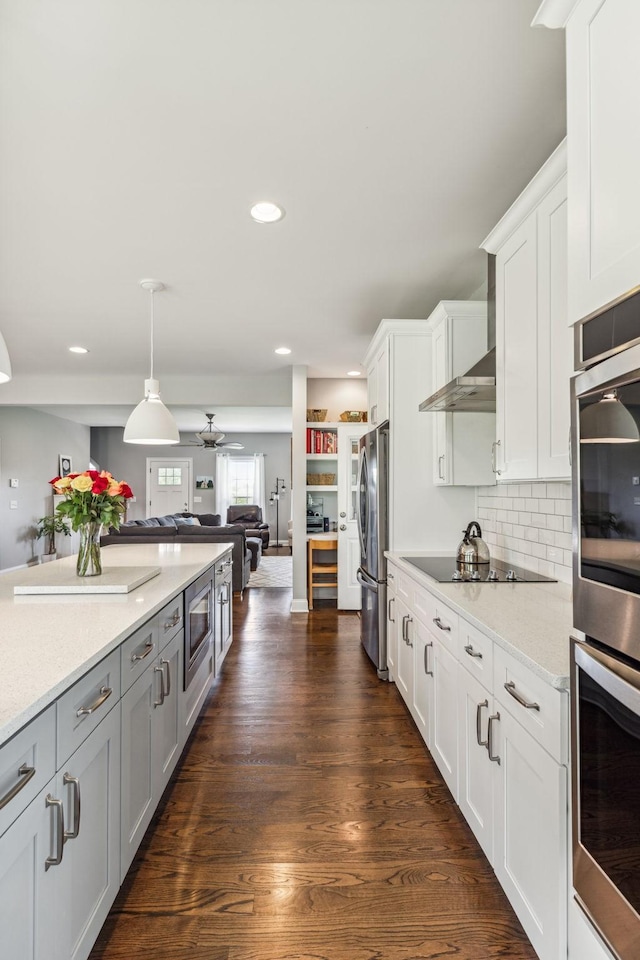 5077 Joe Peay Rd, Spring Hill, TN 37174 - kitchen featuring open floor plan, appliances with stainless steel finishes, a ceiling fan, white cabinets, and recessed lighting