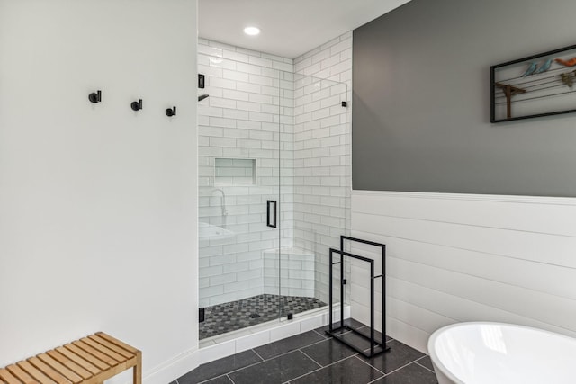5077 Joe Peay Rd, Spring Hill, TN 37174 - full bath featuring a stall shower, a freestanding tub, wainscoting, and recessed lighting