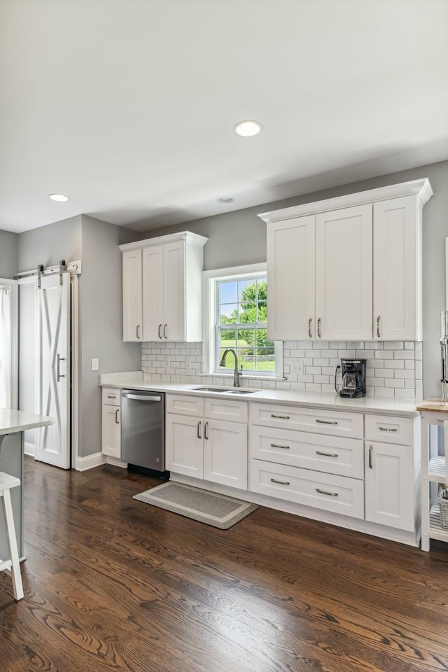 5077 Joe Peay Rd, Spring Hill, TN 37174 - kitchen with stainless steel dishwasher, backsplash, white cabinets, and recessed lighting