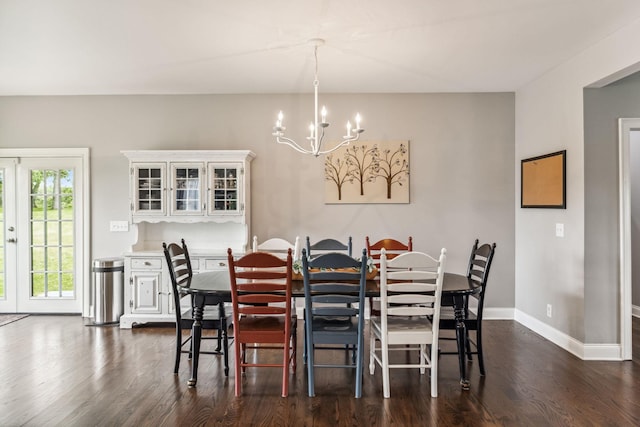 5077 Joe Peay Rd, Spring Hill, TN 37174 - dining area with a chandelier and dark wood finished floors