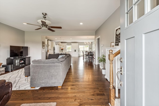5077 Joe Peay Rd, Spring Hill, TN 37174 - living room with dark wood-type flooring, ceiling fan, recessed lighting, a chandelier, and stairs