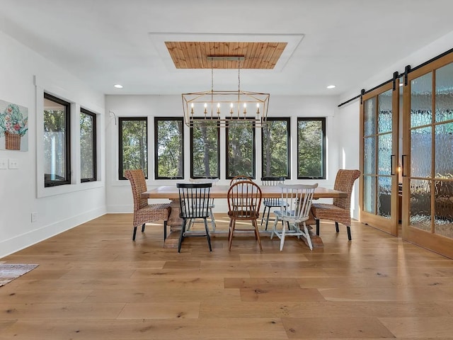2001 Trilogy Ln, Mount Pleasant, TN 38474 - sunroom featuring healthy amount of natural light, a chandelier, and a barn door