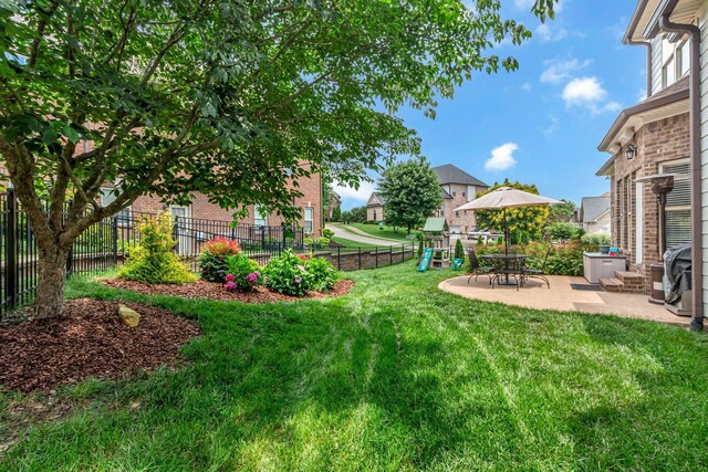 1051 Fitzroy Cir, Spring Hill, TN 37174 - view of yard featuring a playground, a patio, and a residential view