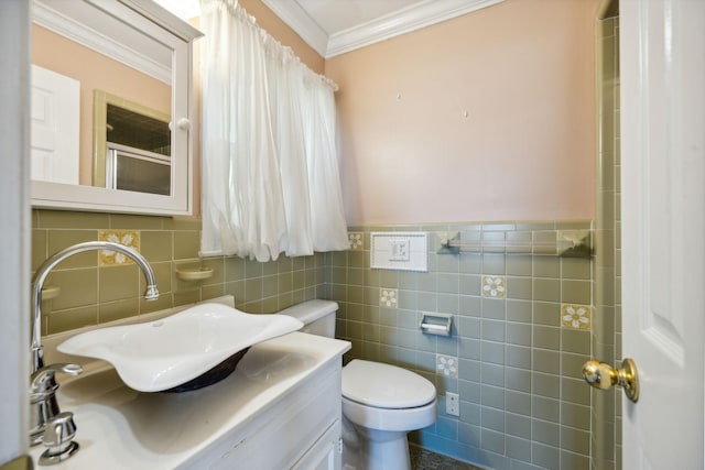 519 Hemingway Dr, Columbia, TN 38401 - bathroom featuring ornamental molding, tile walls, vanity, and a wainscoted wall