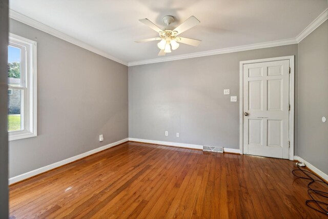 519 Hemingway Dr, Columbia, TN 38401 - unfurnished room featuring plenty of natural light, wood finished floors, a ceiling fan, and crown molding