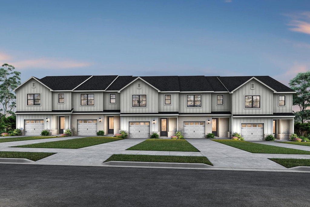 4109 Norman Dr, Spring Hill, TN 37174 - townhome / multi-family property featuring board and batten siding, driveway, and a shingled roof