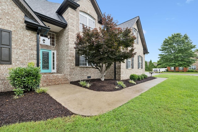 3002 Stow Xing, Murfreesboro, TN 37128 - view of property exterior featuring brick siding, a yard, and roof with shingles