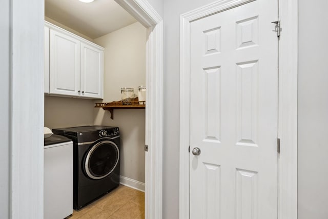 3002 Stow Xing, Murfreesboro, TN 37128 - laundry room featuring washer and dryer, cabinet space, and light tile patterned floors