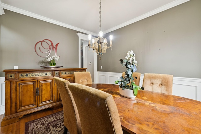 3002 Stow Xing, Murfreesboro, TN 37128 - dining room with a chandelier, ornamental molding, a decorative wall, a wainscoted wall, and dark wood-style flooring