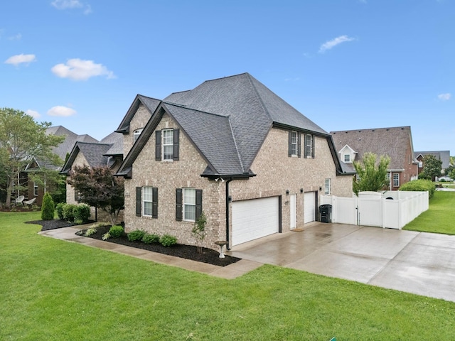 3002 Stow Xing, Murfreesboro, TN 37128 - view of side of home with an attached garage, driveway, roof with shingles, brick siding, and a gate