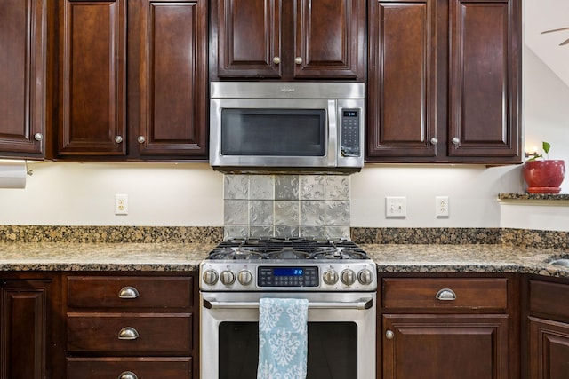 3002 Stow Xing, Murfreesboro, TN 37128 - kitchen with stainless steel appliances, dark brown cabinetry, and decorative backsplash