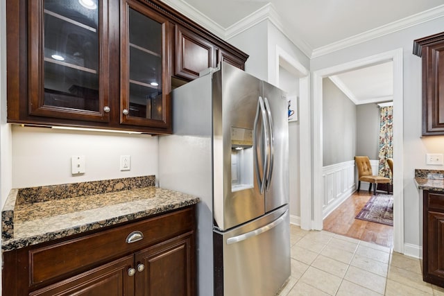 3002 Stow Xing, Murfreesboro, TN 37128 - kitchen with stainless steel fridge with ice dispenser, ornamental molding, dark brown cabinetry, glass insert cabinets, and stone counters