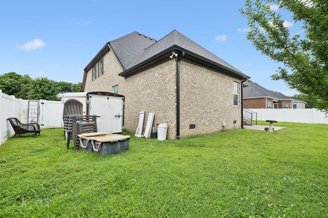 3002 Stow Xing, Murfreesboro, TN 37128 - rear view of house with a fenced backyard, brick siding, crawl space, and a shingled roof