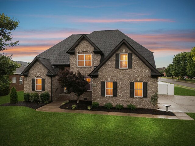 3002 Stow Xing, Murfreesboro, TN 37128 - view of front facade with a front lawn, roof with shingles, brick siding, and concrete driveway