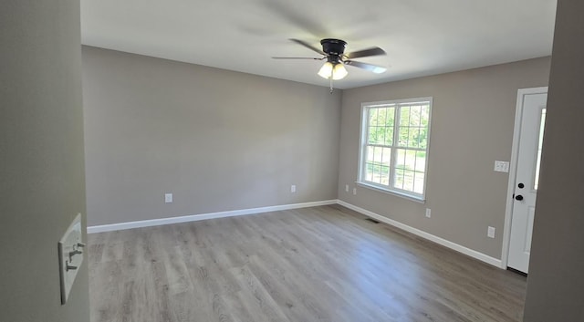 1323 Higginbotham Rd, Mcminnville, TN 37110 - spare room with a ceiling fan and wood finished floors