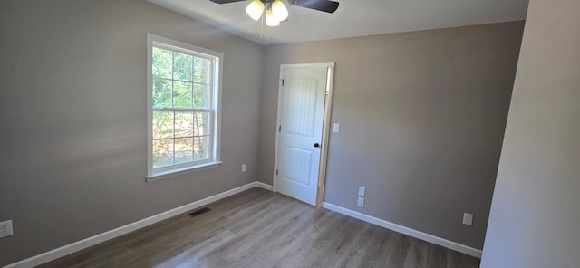 1323 Higginbotham Rd, Mcminnville, TN 37110 - unfurnished room with a ceiling fan and wood finished floors