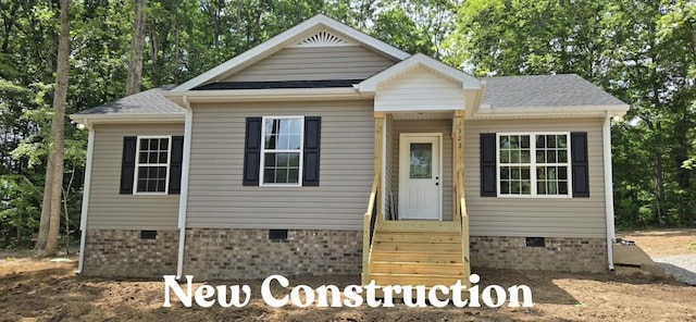 1323 Higginbotham Rd, Mcminnville, TN 37110 - view of front facade featuring crawl space and roof with shingles