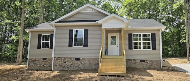 1323 Higginbotham Rd, Mcminnville, TN 37110 - view of front of house with crawl space and a shingled roof
